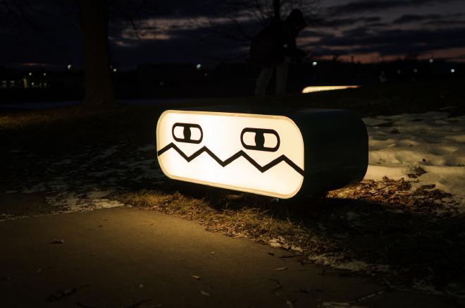 the Doodle Benches with retro, robot-inspired backlit faces